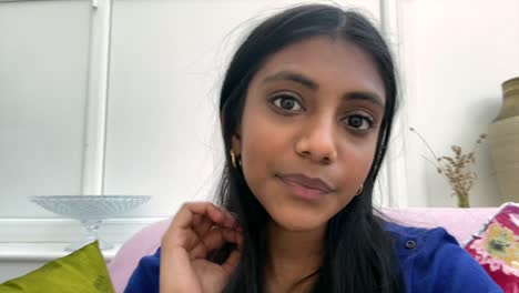 indian asian woman giving bad news over video chat