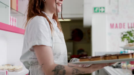 cake, waitress and bakery with woman in store