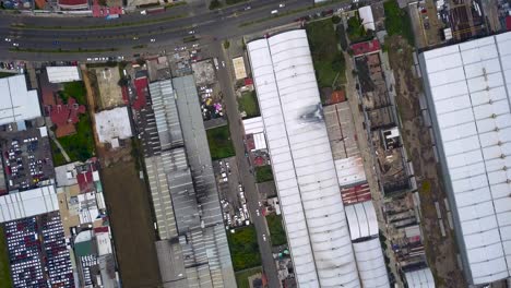 Top view of warehouses in the industrial park of the town of chalco, Mexico with a view of the roads and traffic