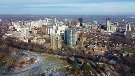 drone flying over downtown hamilton in the winter