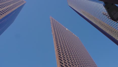 low angle shot downtown. los angeles modern office buildings, skyscrapers, banks, downtown apartments in la. urban life, financial business center.