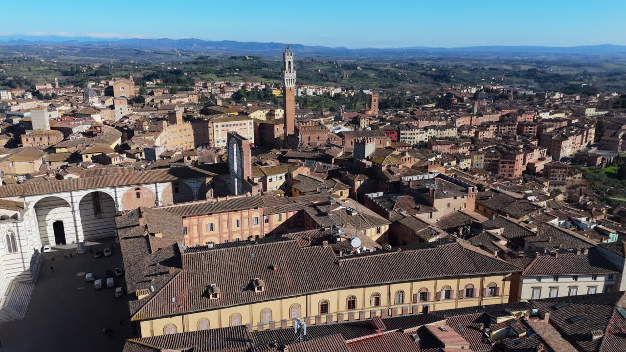 Siena, italy, showcasing historic architecture and the torre del mangia, aerial view
