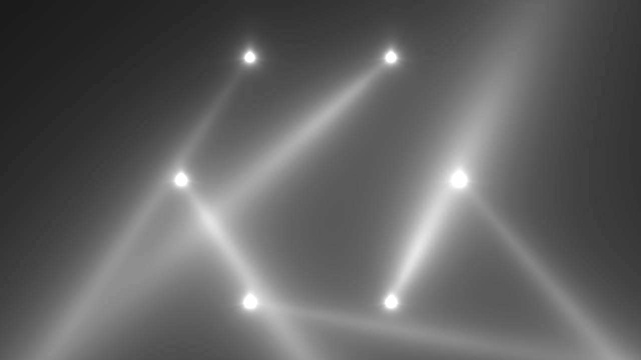 무대의 어두운 배경에 애니메이션 동작 흰색 빛나는 스포트라이트 빔