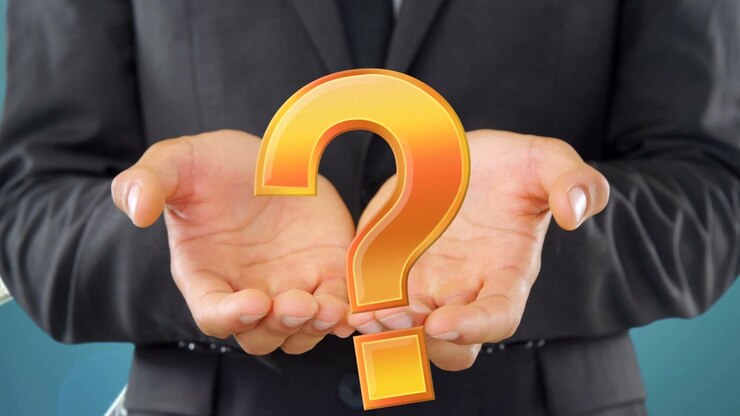 Businessman holding cupped hands, 3D question mark popping, scaling in hands showing finance doubt