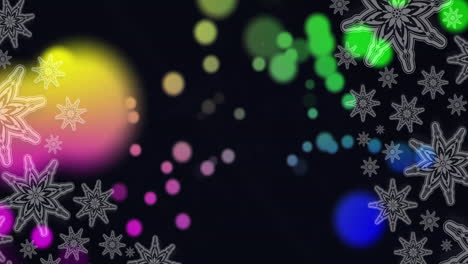 Colorful-bokeh-lights-and-snowflakes-falling-on-dark-background