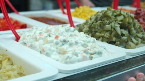 assortment of salads and sides at a restaurant