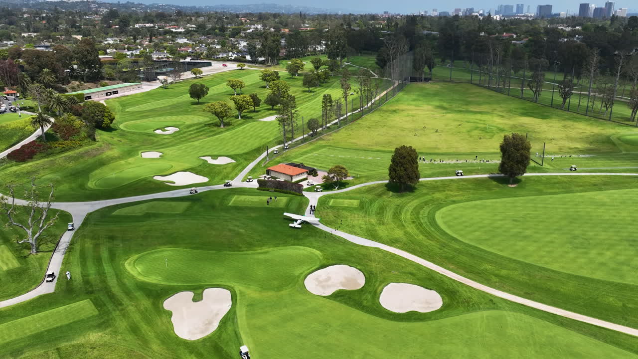 Panoramic drone shot of a airplane emergency landed on a golf course in LA