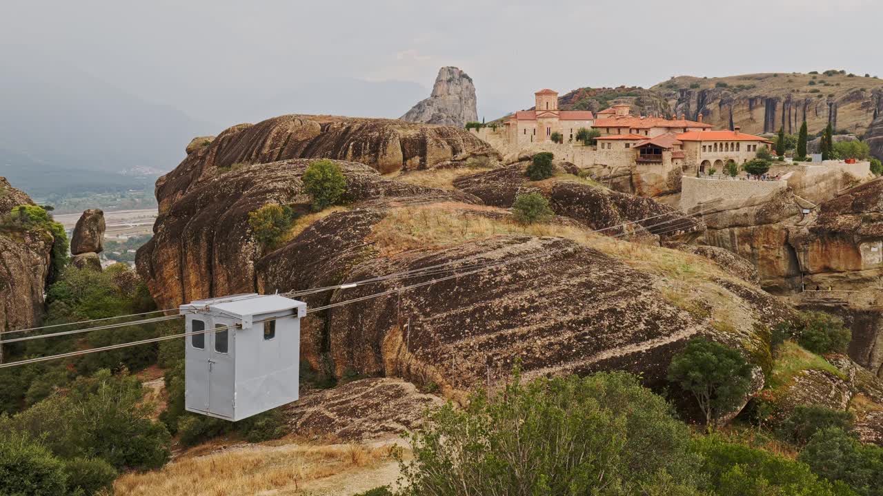 Cable car travels over mountain crevice to Holy Trinity monastery Meteora