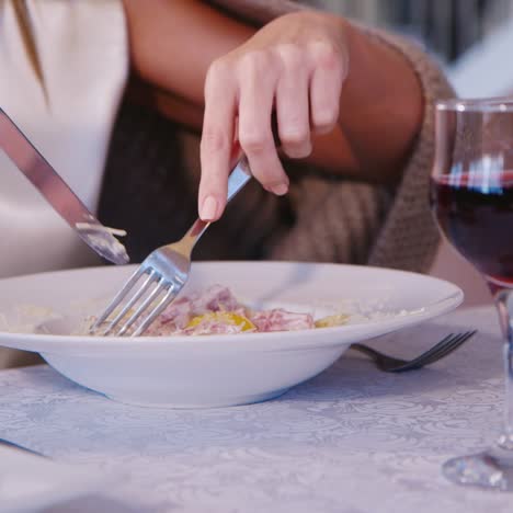 woman eating in a restaurant