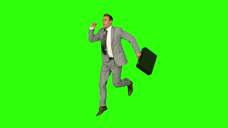 businessman jumping on green screen