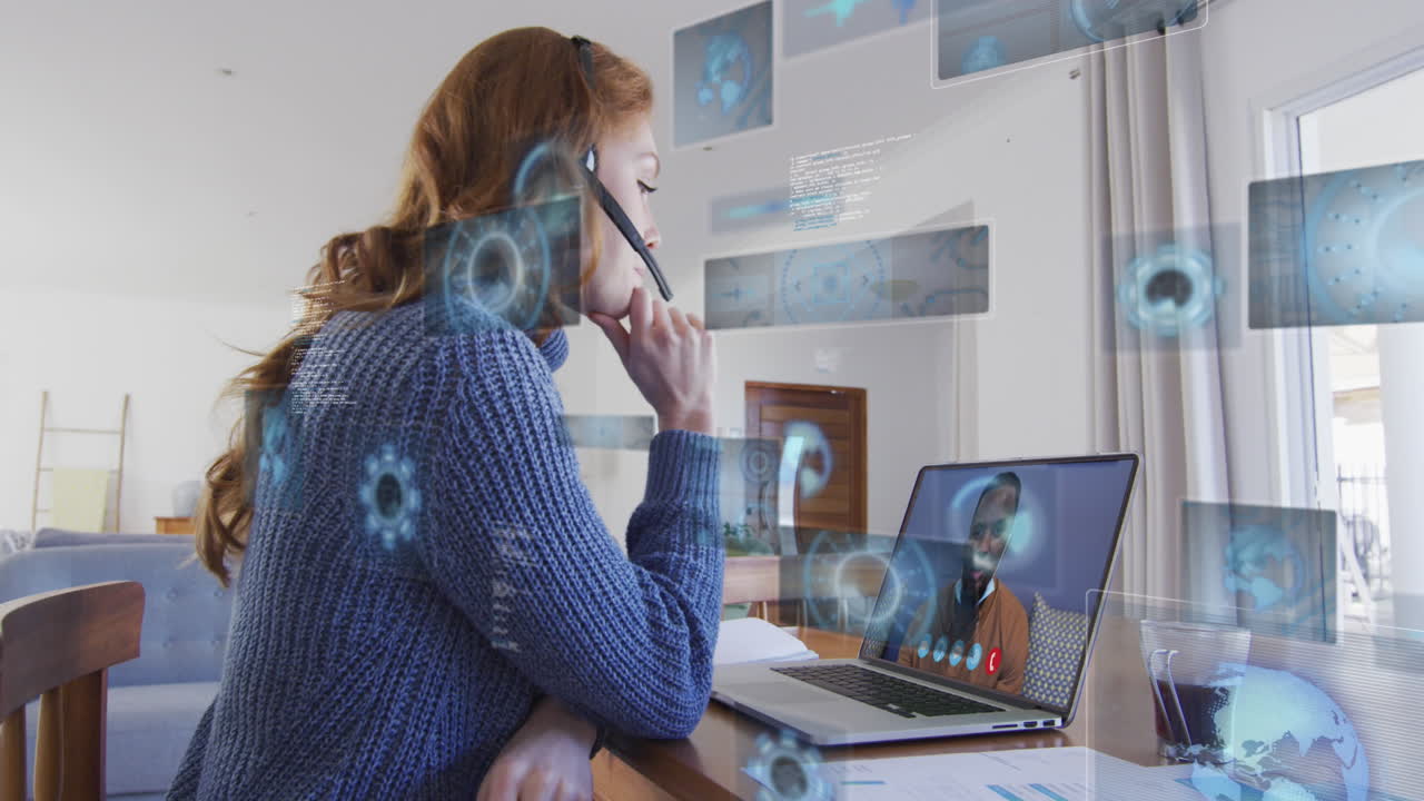 Animation of data processing over caucasian businesswoman on laptop video call