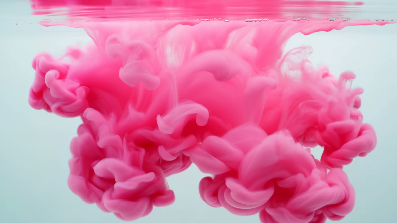 Pink Ink Swirling In Water, Cinematic Slowmotion Study Of Pink Dye Cascading Into Clear Tank, Forming Soft