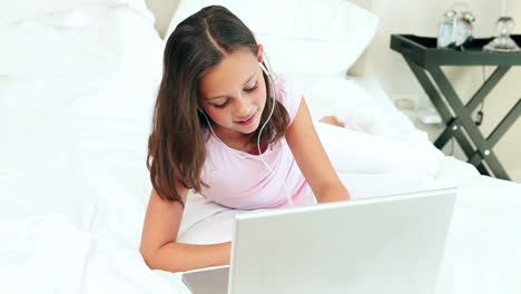 Young-girl-looking-at-her-laptop