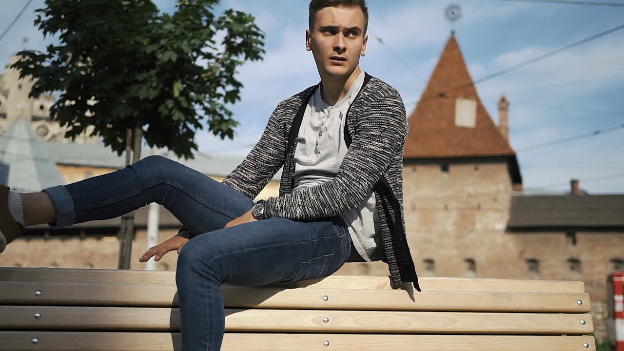 Man Relaxing on Bench
