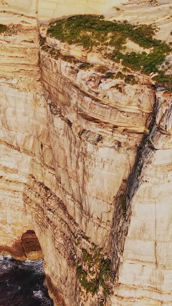 Explore the cliffs of Malta near the coastline during daytime