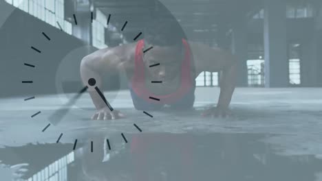 Animation-of-clock-ticking-over-man-doing-push-ups-in-an-abandoned-building