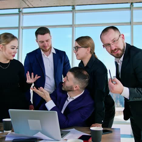 business executives interacting with each other in conference room at office