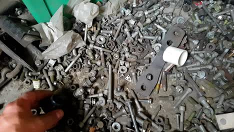 Sorting through assorted nuts - bolts