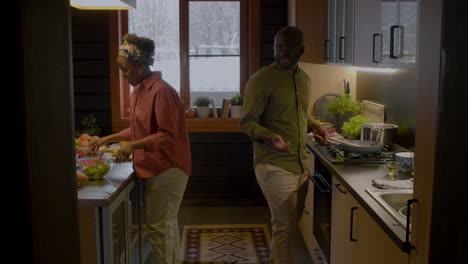 couple cooking in the kitchen