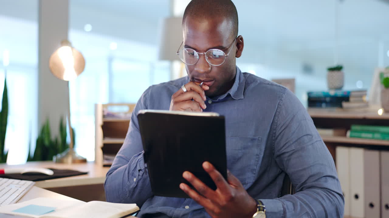 Tablet, thinking and writing with a black man