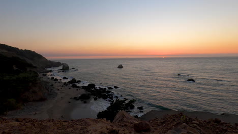 sun cresting the horizon at sunset along the california coast from the view of the san francisco bay on a beautiful summer night - 4k
