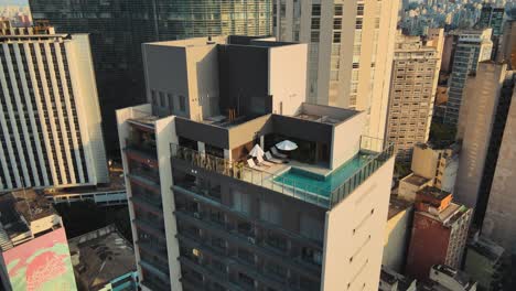 drone aerial shots buildings sao paulo city sunset center city constructions aerialshot big sun brazil jungle of rock rooftop infinit pool