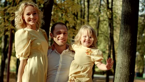 happy family make a photo in autumn park