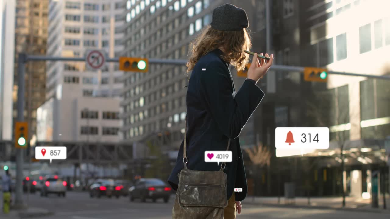 Adult male crossing crosswalk speaking into phone and generating pins likes alerts for marketing