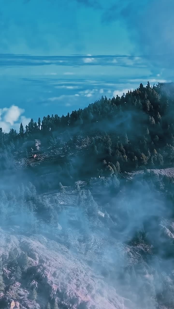 Aerial view of Gran Canaria landscape with mist over mountains
