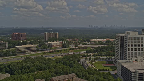 Atlanta-Georgia-Aerial-V670-Pan-Right-Shot-Of-High-Rise-Headquarter,-Forest-And-Freeway-In-Vinings-–-Dji-Inspire-2,-X7,-6k-–-August-2020