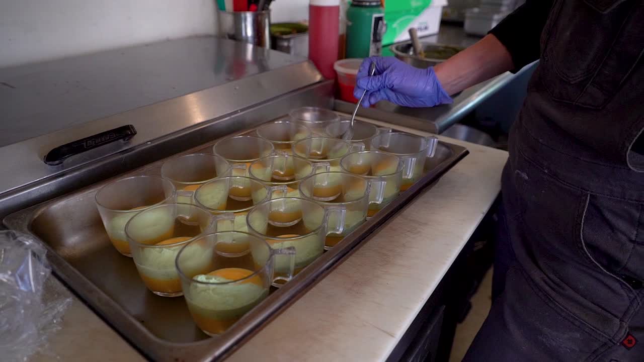 Chef Preparing a Delicious Egg Dish in a Restaurant Kitchen