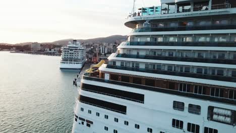 cruise ship in port at sunset