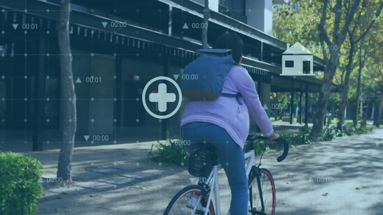 Animation of eco icons and data processing over biracial woman riding bike