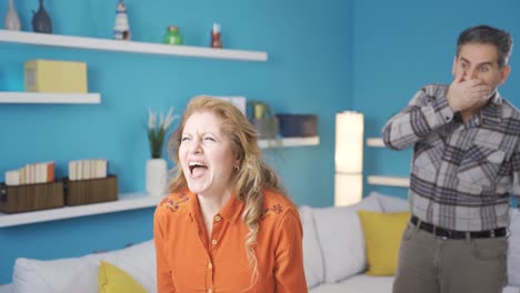 Tired of her husband&#039;s scolding, the woman screams.