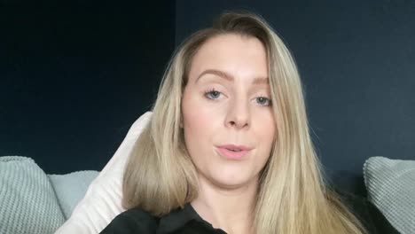 caucasian woman tells funny story over video chat