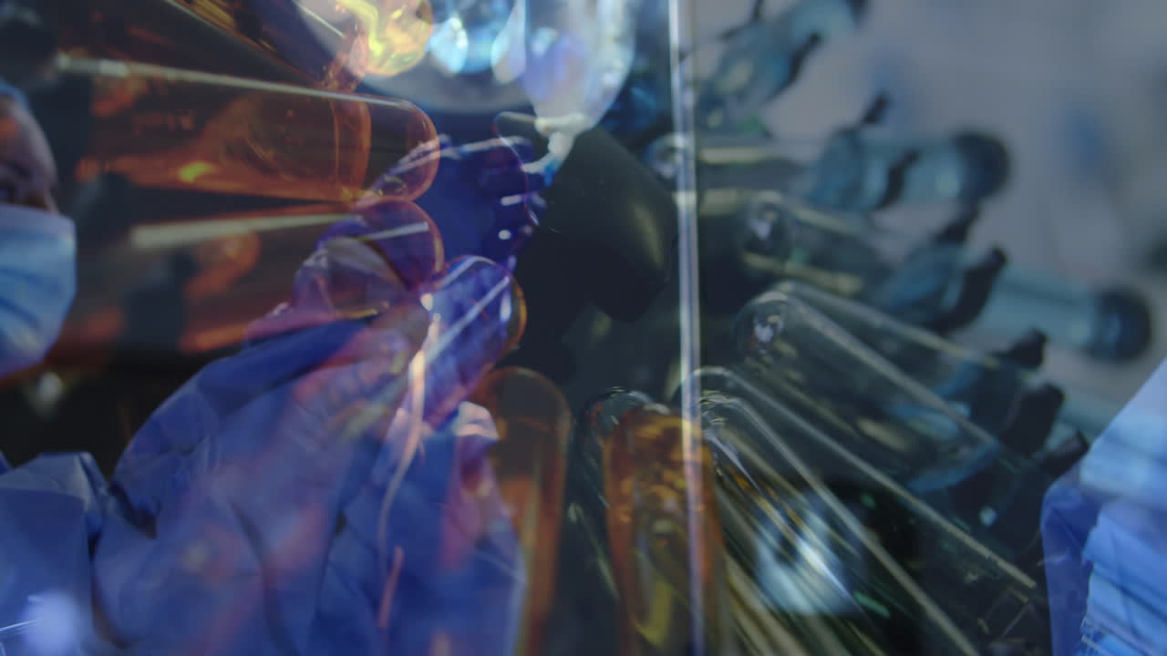 animación de tubos de ensayo que giran sobre cirujanos con máscaras faciales en el quirófano