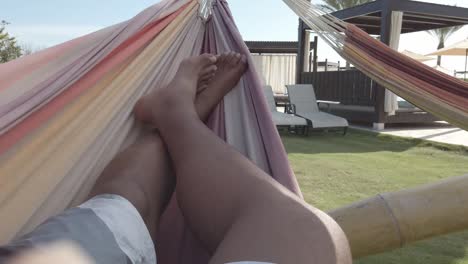 chilling in a hammock on a hot sunny day in the caribbean