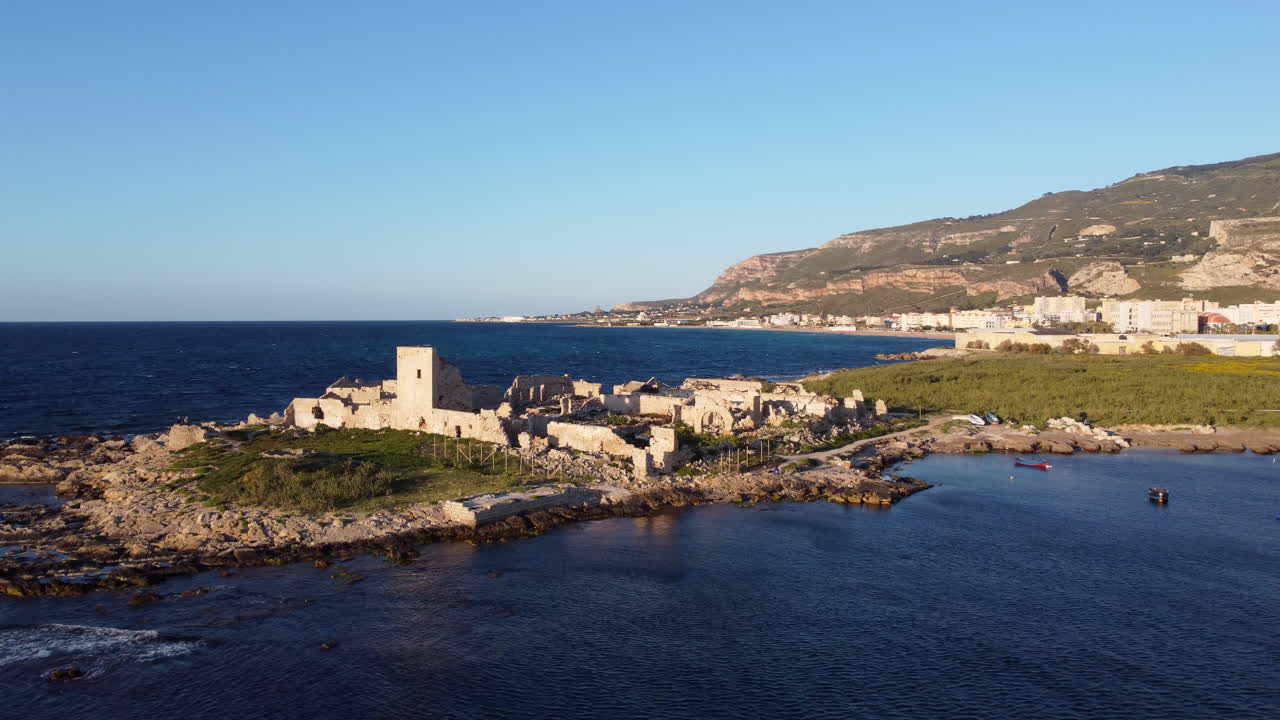 Aerial flying towards Tuna fishery of San Giuliano, Sicily, Italy