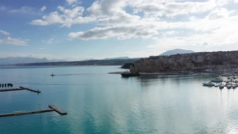 Aerial-Parallax-Shot-View-Of-Castellammare-Del-Golfo-Port-Harbour-In-Sicily