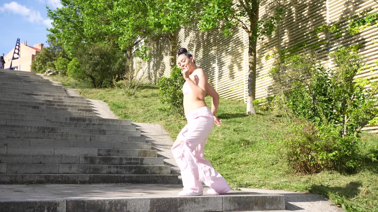 Woman Dancing in Park