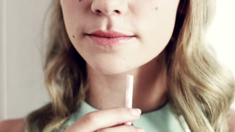 Pretty-girl-drinking-milk-with-straw