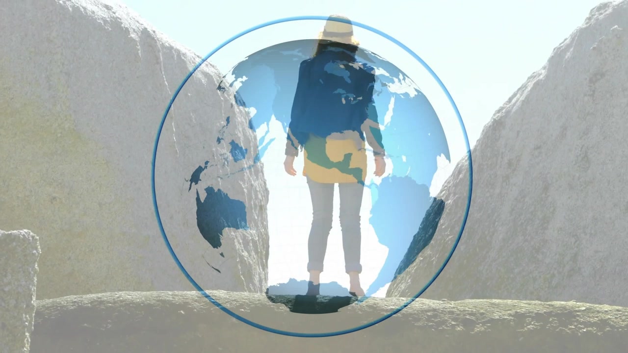 Globo di marketing turistico che ruota davanti a un canyon, mostrando un escursionista che sale su una sporgenza e fa trekking nel canyon.