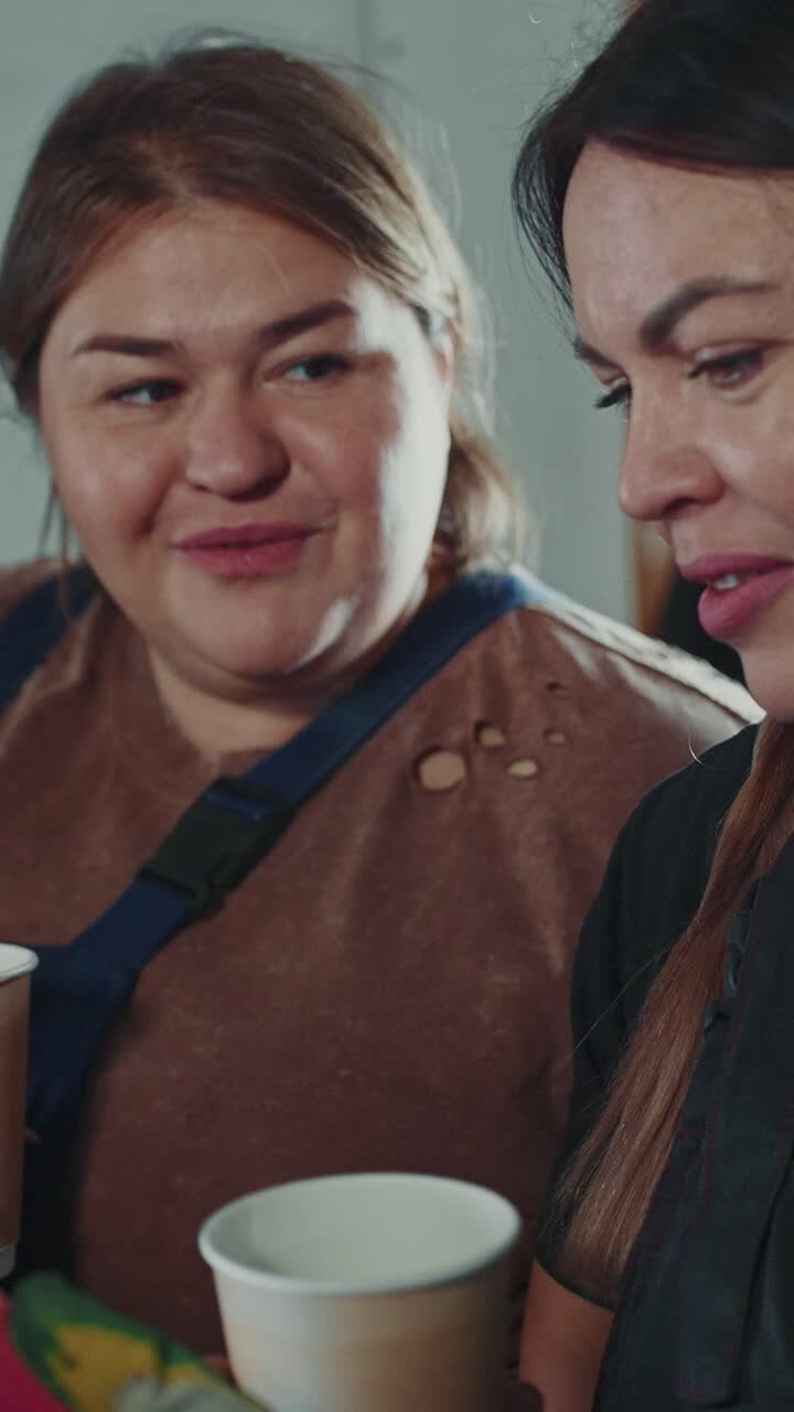 Women Discussing over Coffee