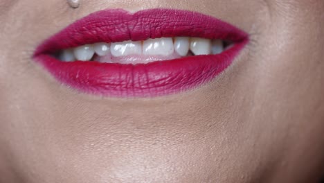 woman smiling with red lipstick