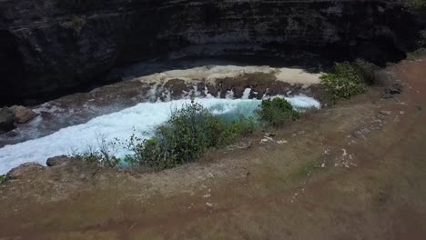 dramatic aerial view flight drone camera pointing down shot
broken beach at nusa penida bali indonesia