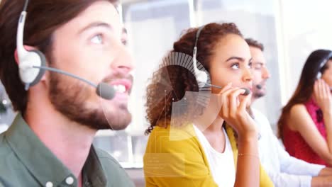 Animation-of-digital-interface-over-business-people-wearing-phone-headsets