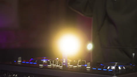 man djing at the disco