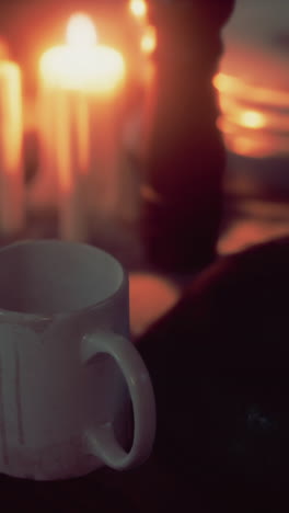 empty mug in candlelight