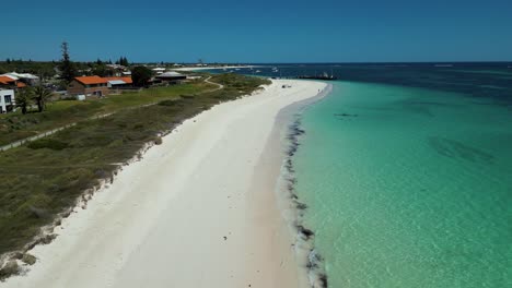Aerial-view-of-Lancelin-town-white-sand-beach-and-crystal-clear-turquoise-water-landscape-shoreline,-Western-Australia