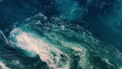 waves of water of the river and the sea meet each other during high tide and low tide.